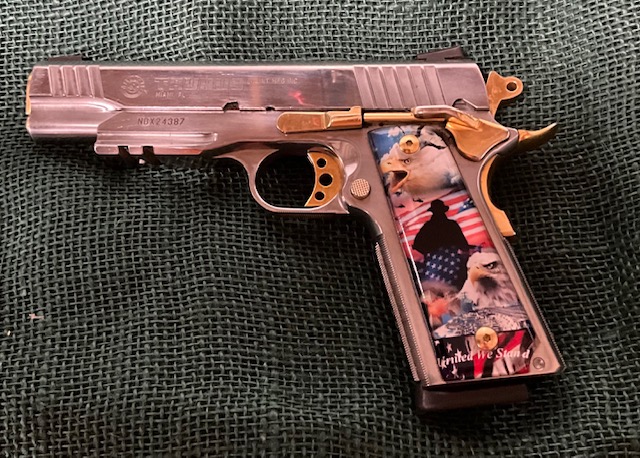 Featured image for “Special Collectors Edition, TAURUS, 45 cal Semi-Auto. Extra pearl style grips.”